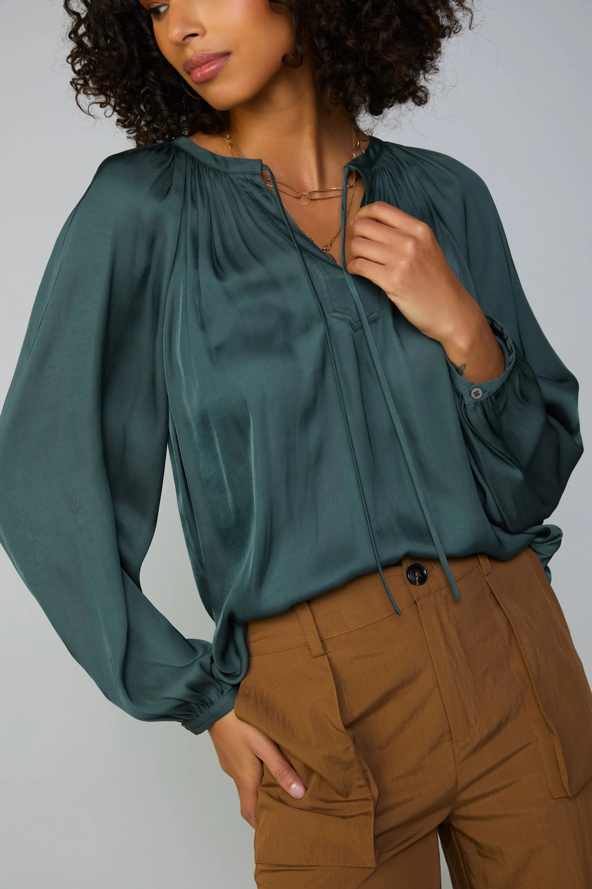 GATHERED SPLIT NECK BLOUSE Compression